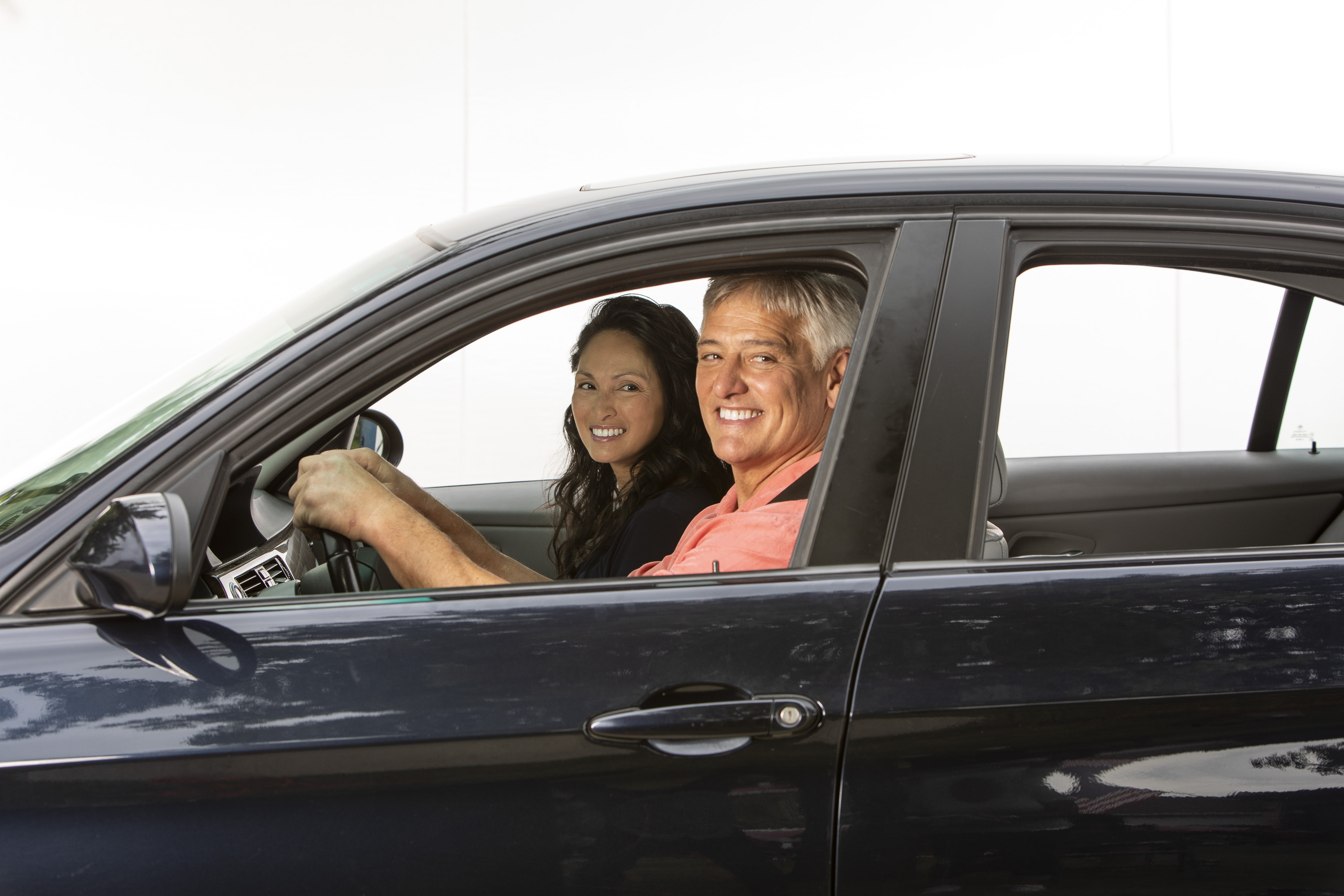 Mature Driver with Passenger